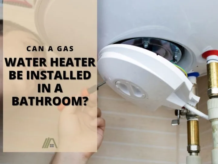 A water heater being fixed inside a tiled room; Can a Gas Water Heater Be Installed in a Bathroom