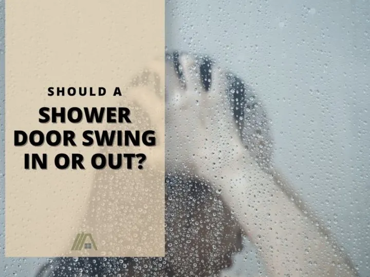Frustrated woman holding her head behind a shower door with covered with water & moist; Should a Shower Door Swing In or Out?