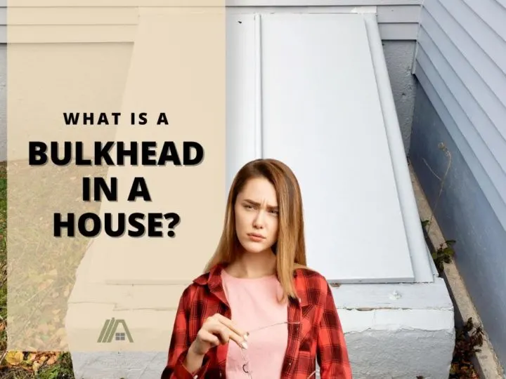 Woman wearing red checkered blouse with a questioning expression; What Is a Bulkhead in a House (Two possible definitions)