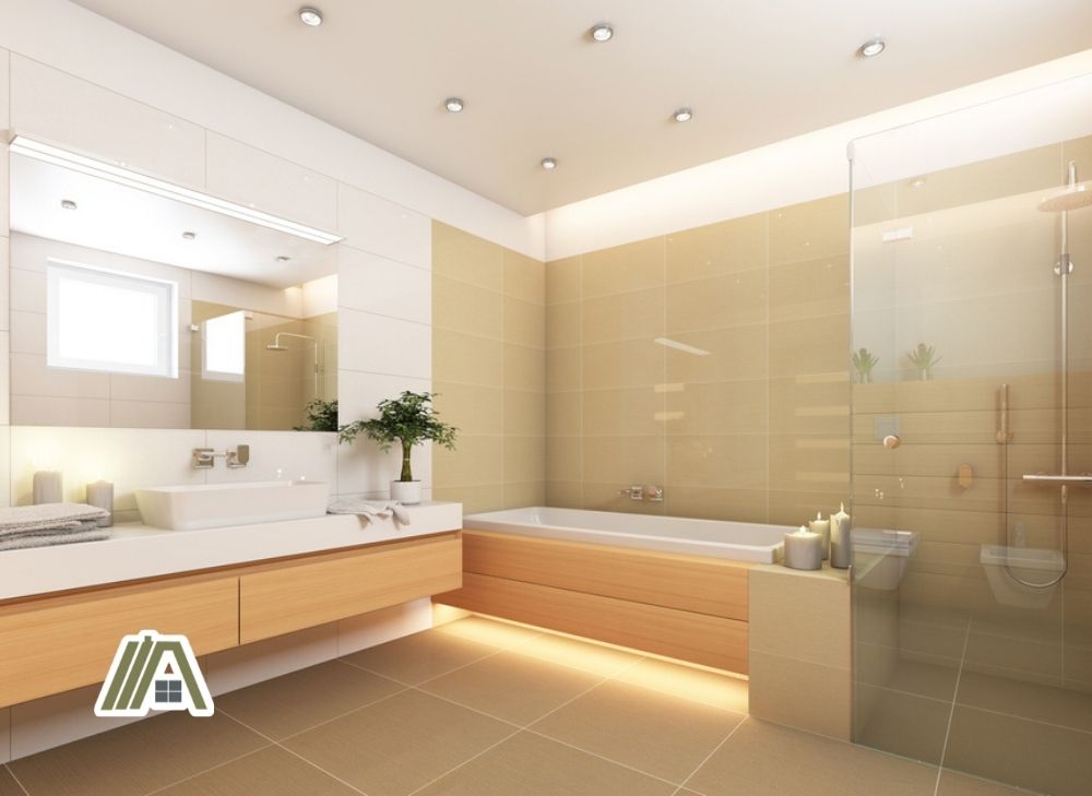 Modern bathroom with bathtub and glass shower door