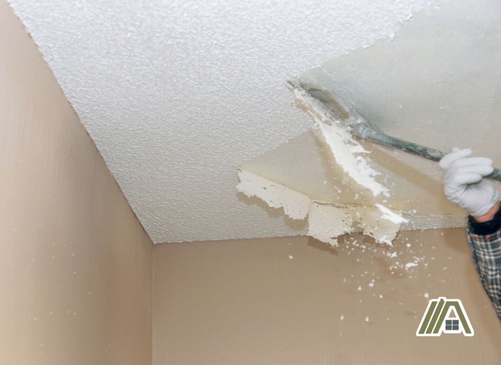 Removing and scraping off popcorn ceiling