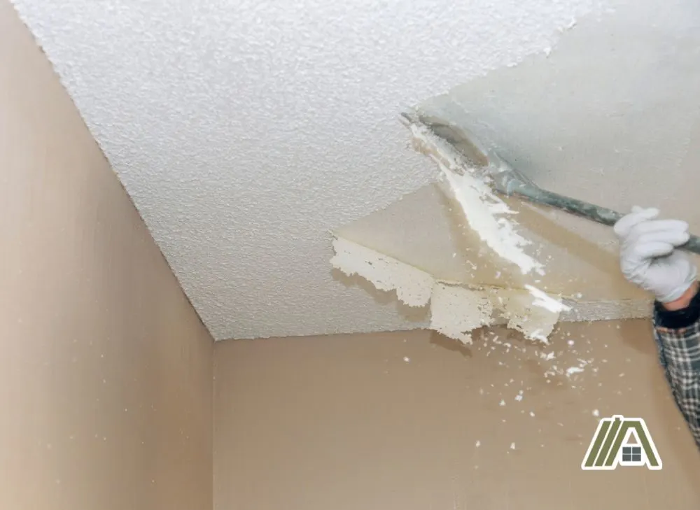 Removing and scraping off popcorn ceiling