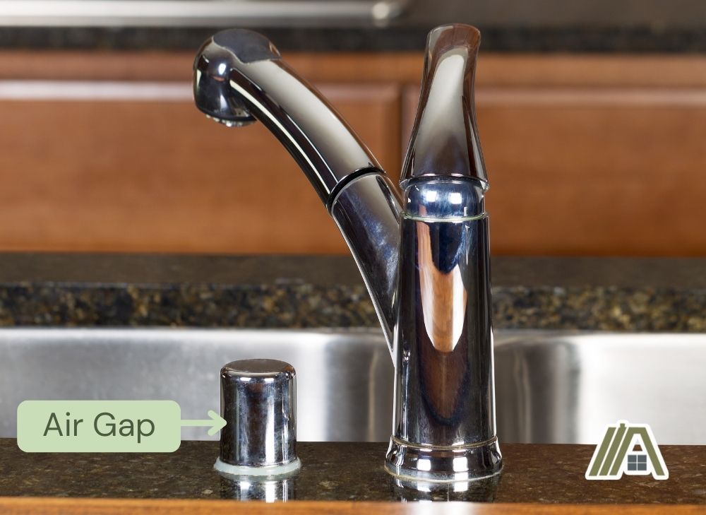 Stainless steel faucet with dishwasher air gap installed