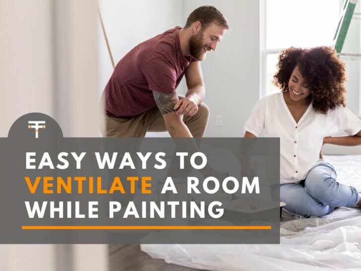 Man and woman painting a room