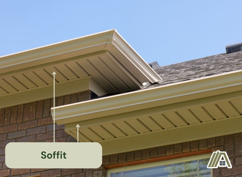 Cream colored soffit installed in a brick walled house