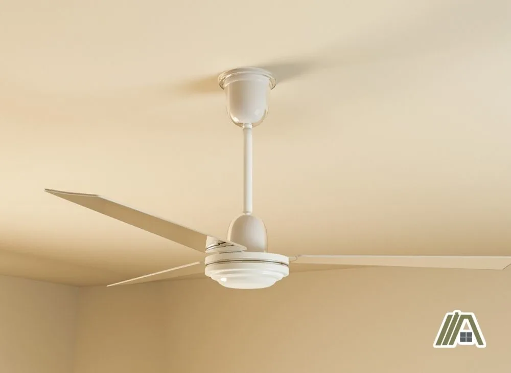 White three-bladed ceiling fan