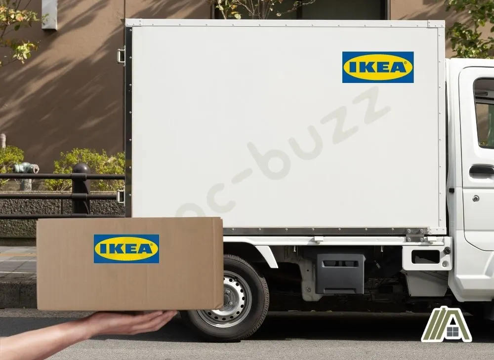 White truck with IKEA logo and a hand holding a box from IKEA