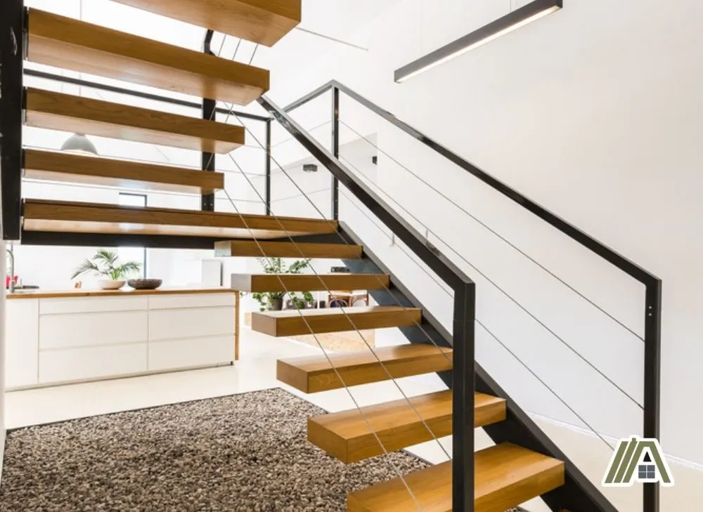 Modern style staircase made of wood and steel with open risers