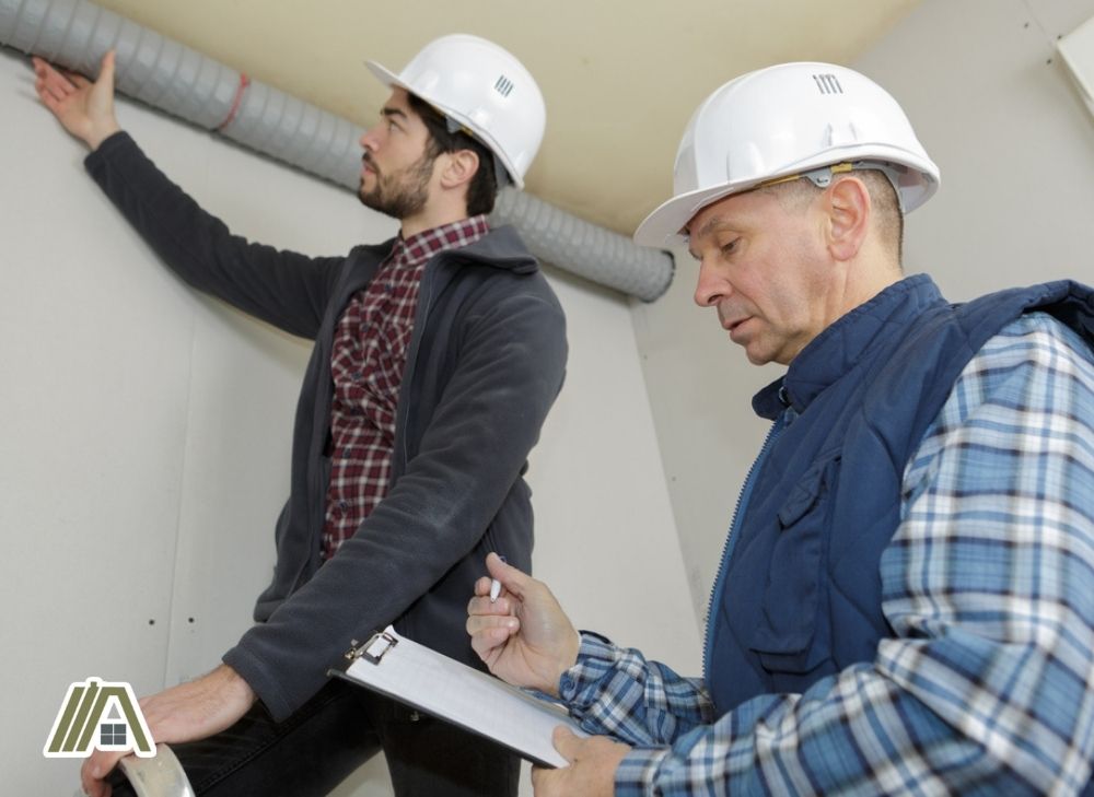 Men inspecting ducts and ventilation.jpg