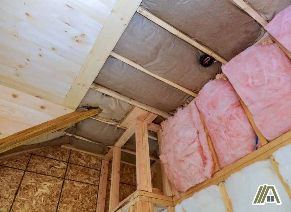 Pink fiberglass insulation installed on the walls.jpg