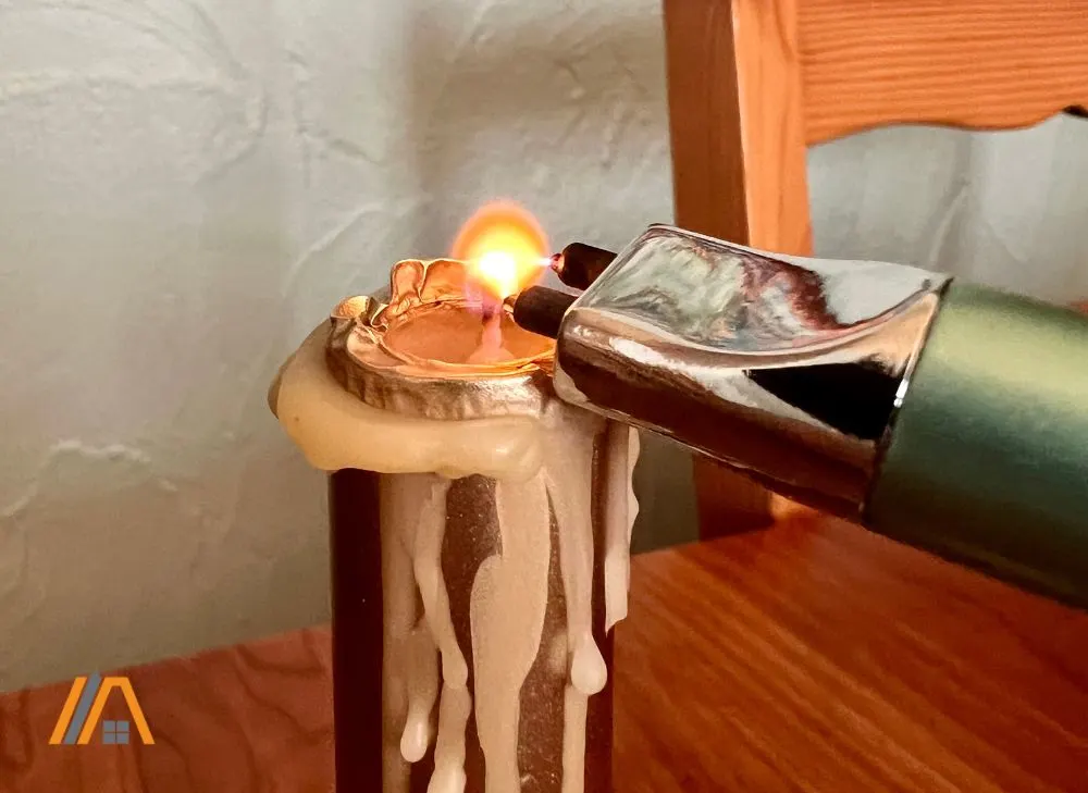 Lighting a candle using a REIDEA lighter