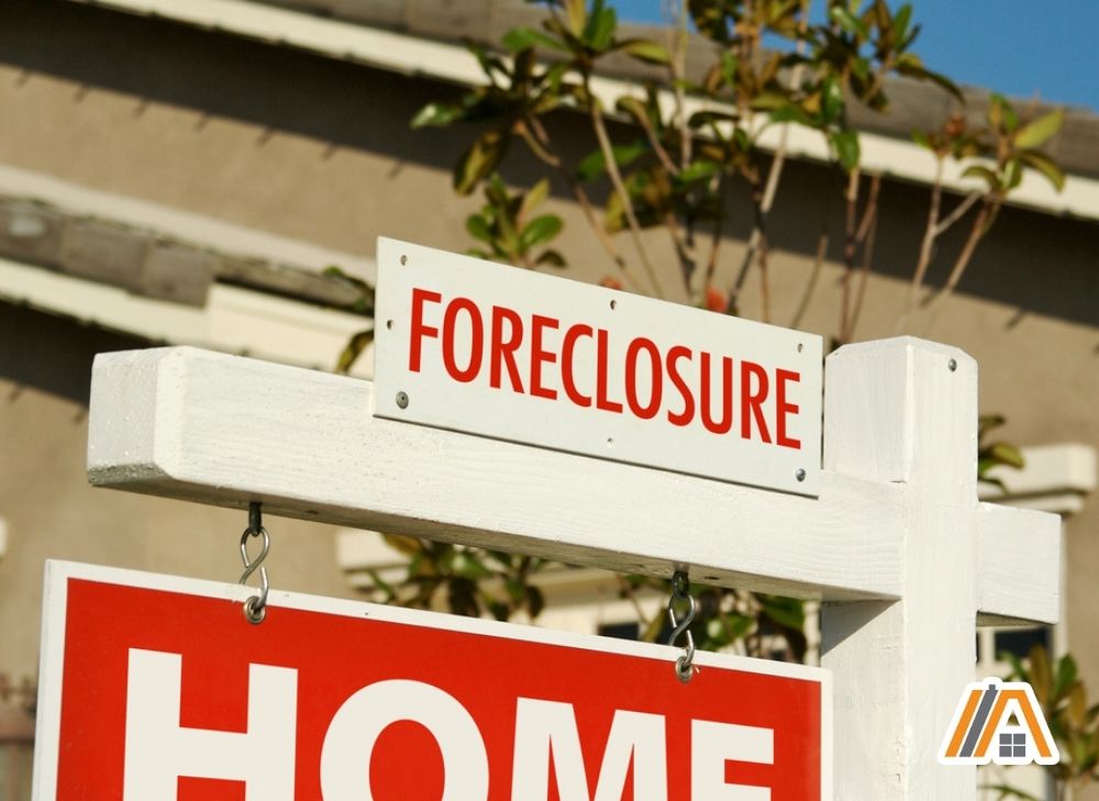 Foreclosure sign outside of a house