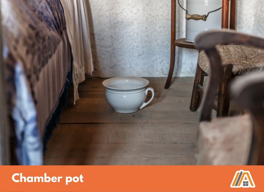 Chamber pot inside the bedroom, old urinal