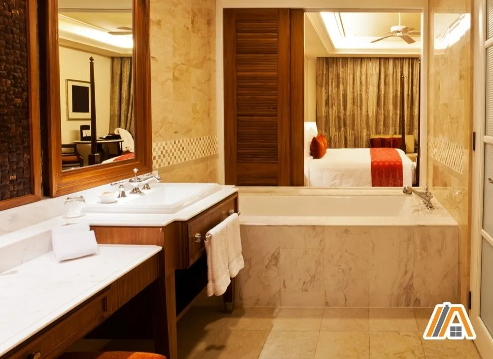 Luxurious bathroom hotel with bathtub and a window overlooking the bathroom